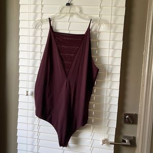 Express bodysuit. New without tags. Burgundy/ wine color.